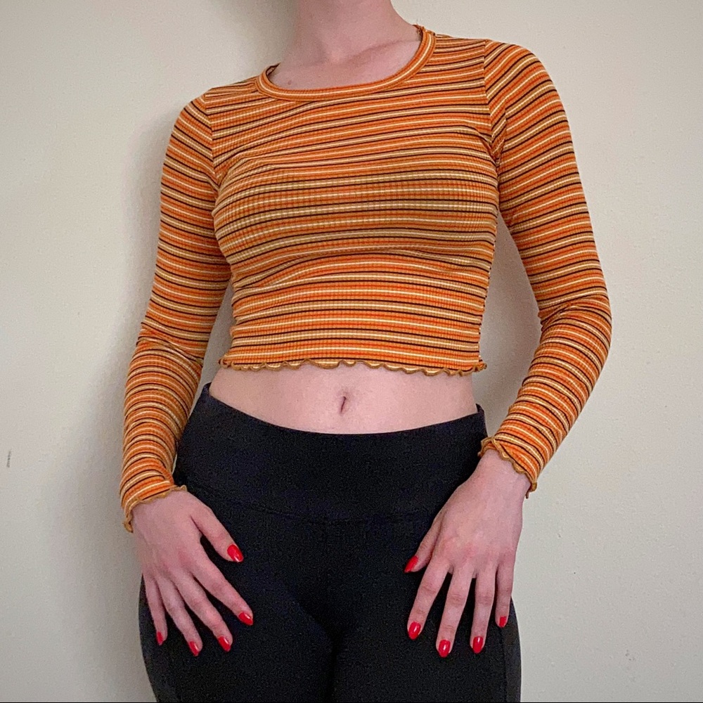 Striped long sleeve crop top with lettuce hem.